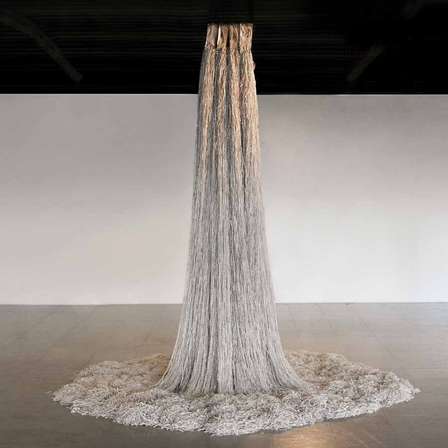 Jukhee Kwon, /fromthebooktothespace/, 2012. 10 books and bookcase, various dimensions. Image courtesy La Scatola Gallery